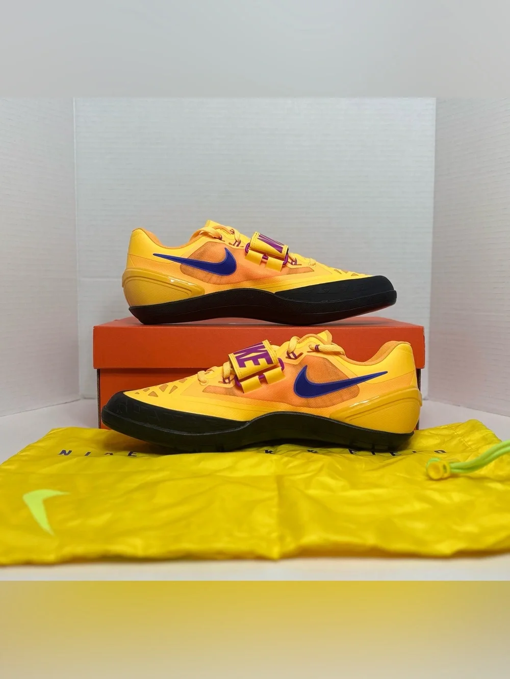Nike Men’s Athletic Shoes - Yellow with Blue Swoosh Track & Field Throwing shoes
